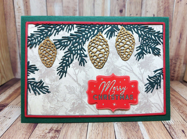 Kokorosa Metal Cutting Dies With Pine Cones Background Board