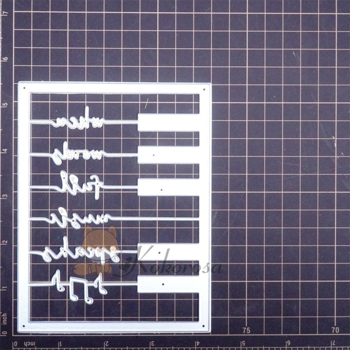 Kokorosa Metal Cutting Dies with Piano Background Board & "when words fail music speaks" Word