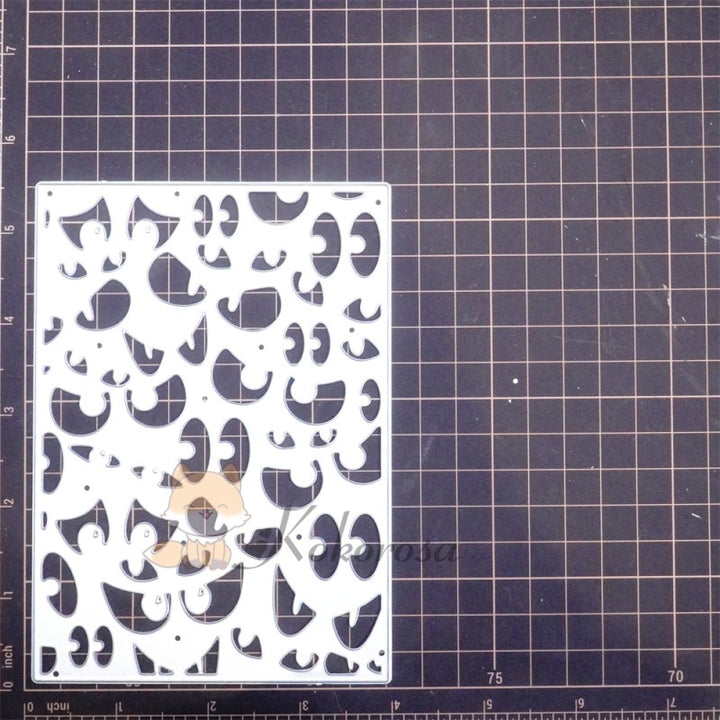Kokorosa Metal Cutting Dies with Staring Eyes Background Board