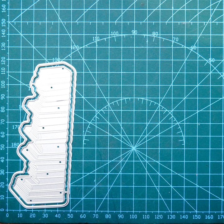 Kokorosa Metal Cutting Dies with Book Pile