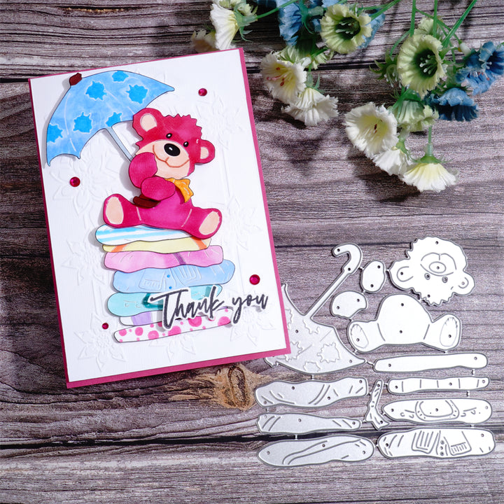 Kokorosa Metal Cutting Dies with Bear Holding an Umbrella Sitting on Sheets