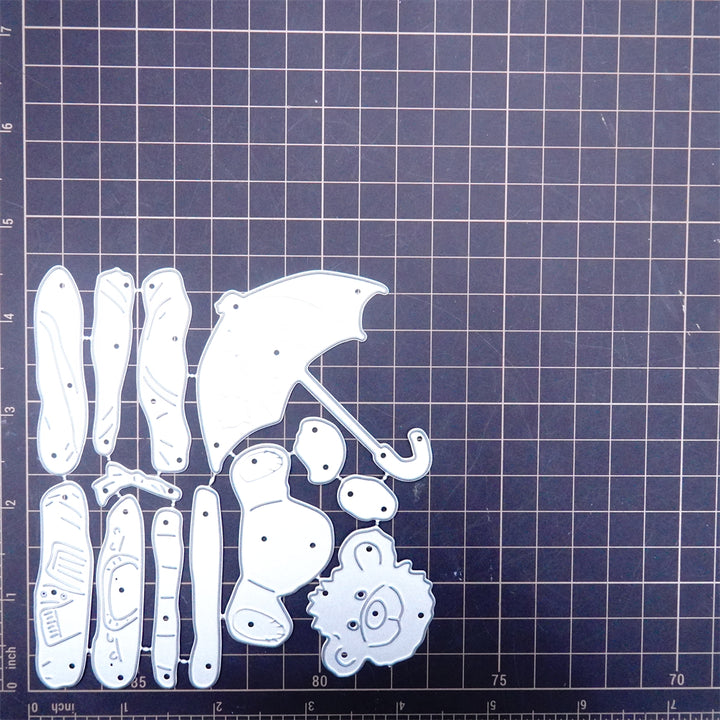Kokorosa Metal Cutting Dies with Bear Holding an Umbrella Sitting on Sheets
