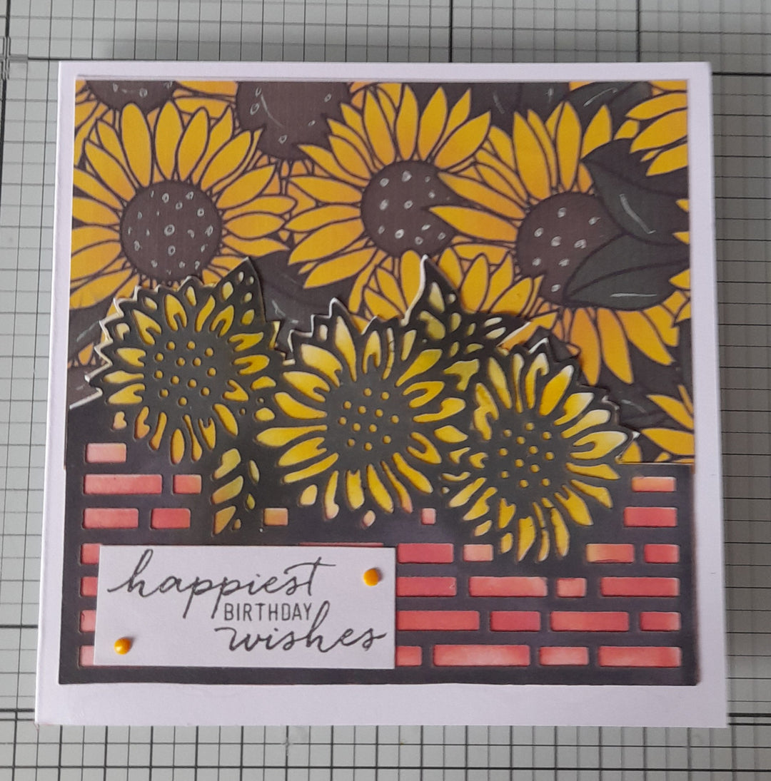 Kokorosa Metal Cutting Dies with Daisies on Brick Wall