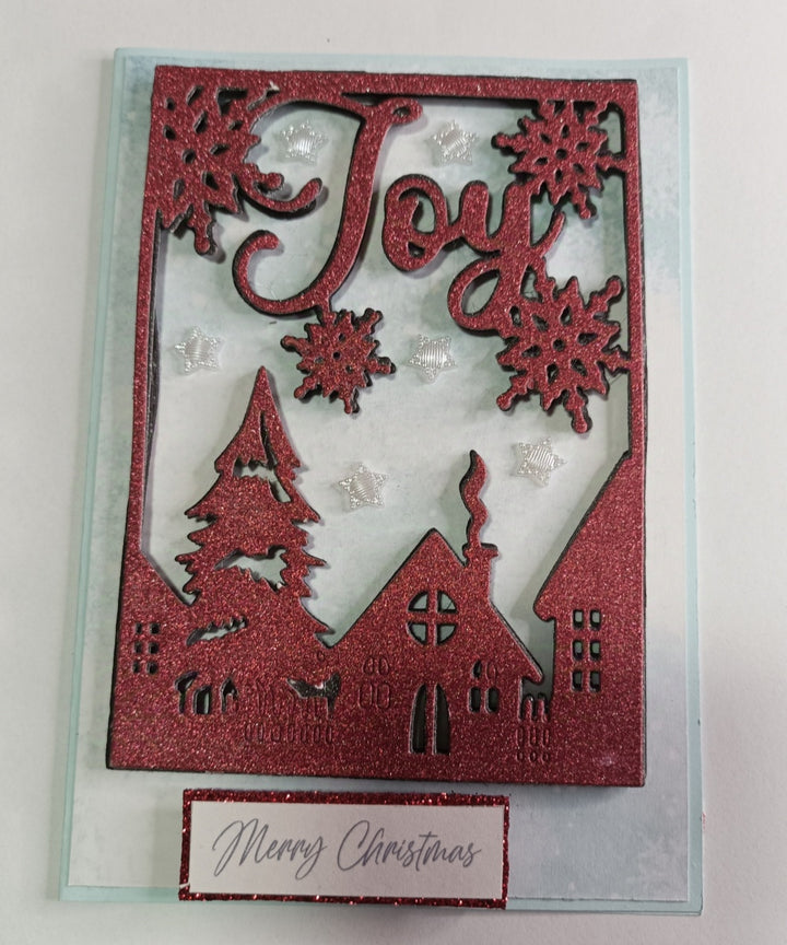 Kokorosa Metal Cutting Dies with 'JOY' Village in the Winter Background Board