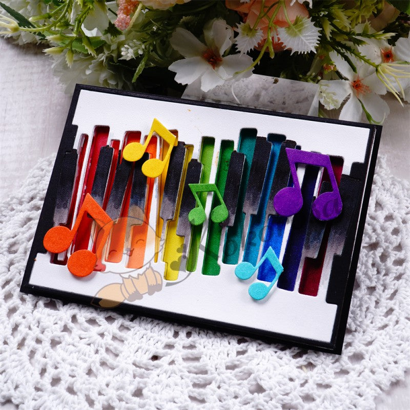 Kokorosa Metal Cutting Dies with Piano Keys & Notes Background Board
