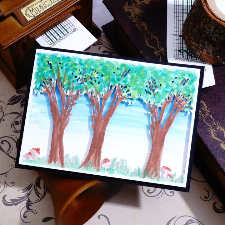 Kokorosa Metal Cutting Dies with Three Trees Background Board